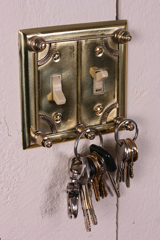 Illustration for article titled DIY Steampunk Light Switch Plates